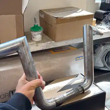Raw steel custom handlebar built from a customer sketch in the Steel Guru workshop